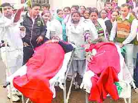 Health workers stage protest.